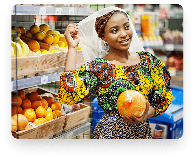 Market woman holding fruit